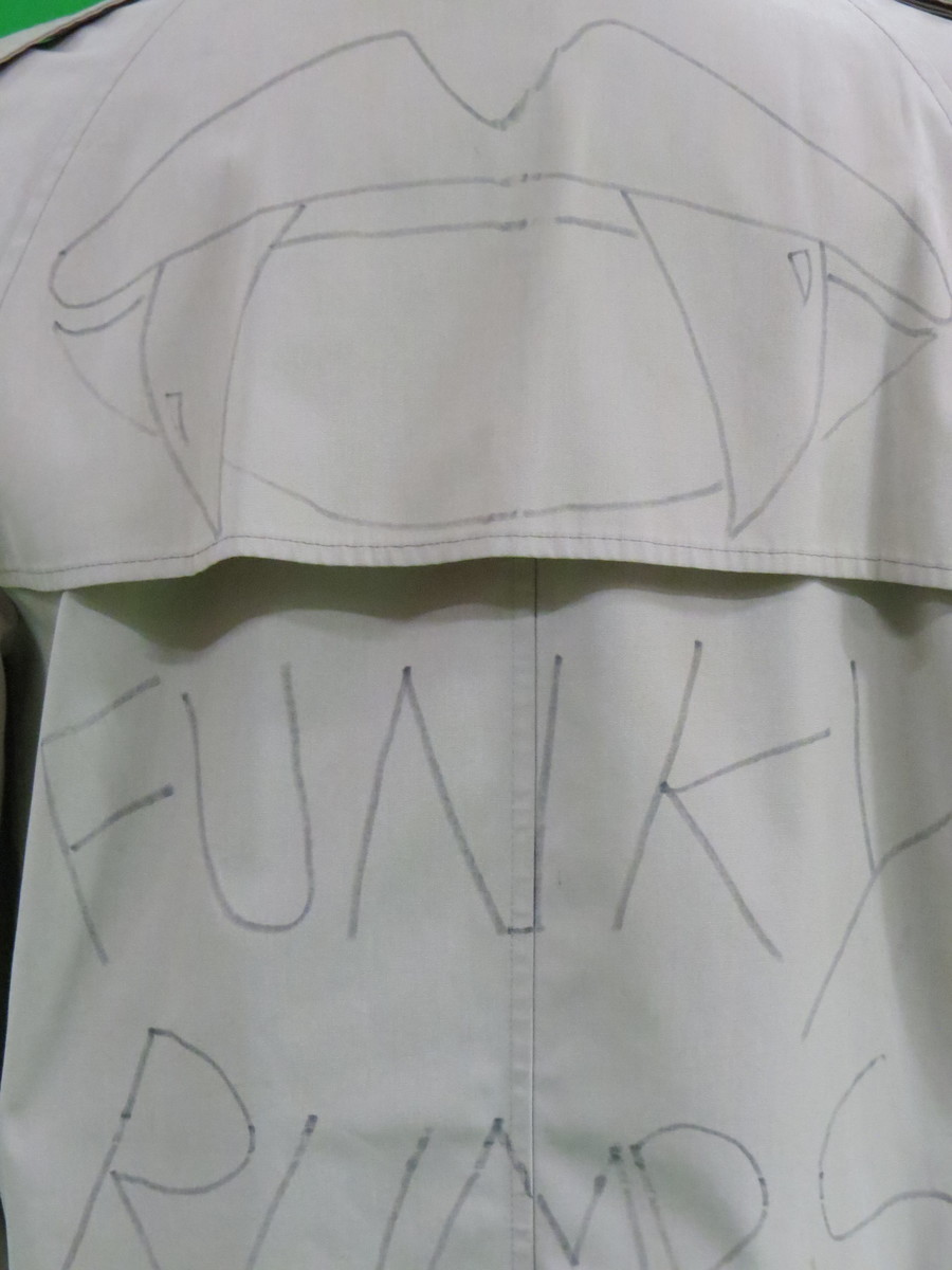 Stage worn with hand drawing tan trench coat , worn by Anthony Kiedis at "The Funky Rumpus Tour"